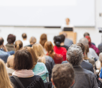 pngtree-a-female-lecturer-delivering-a-presentation-at-a-university-lecture-hall-picture-image_9091573