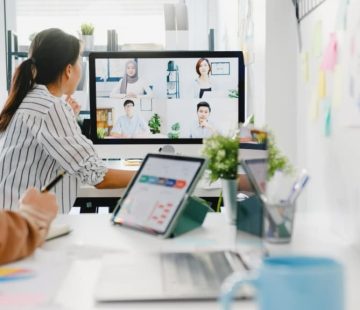 asia-businesspeople-using-desktop-talk-colleagues-discussing-business-brainstorm-about-plan-video-call-meeting-new-normal-office-1024x576